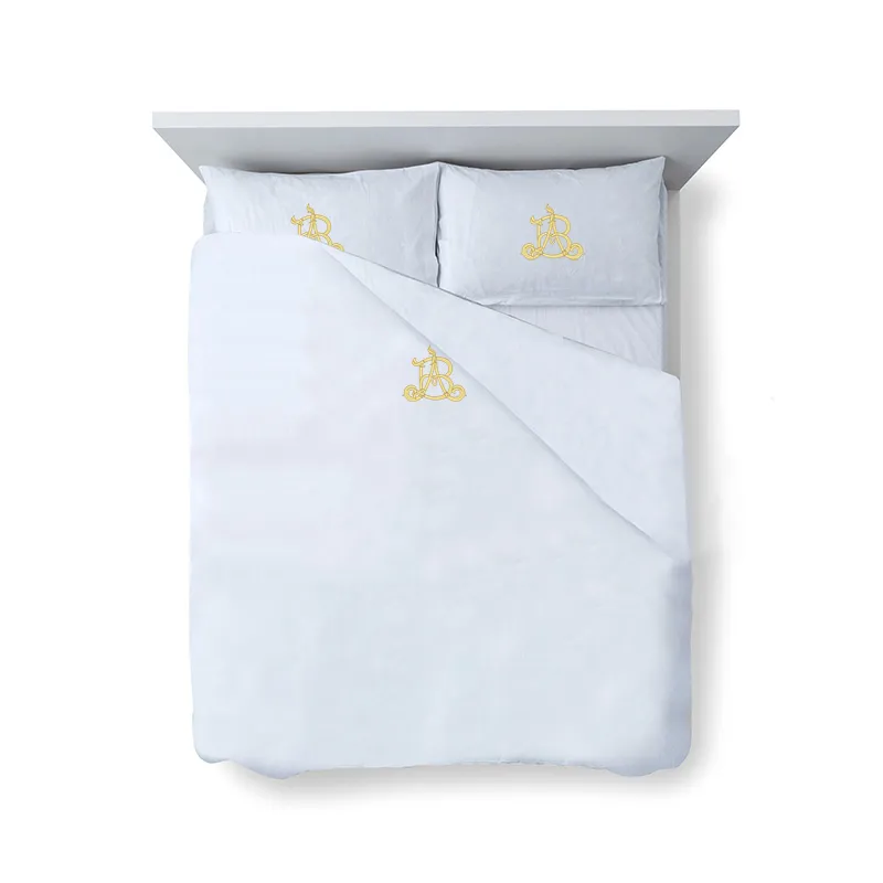 Ensemble de draps lits brodés avec monogramme