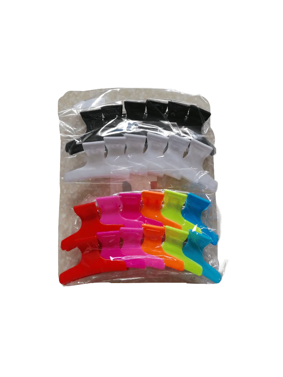 Paquet de 12 Petites pinces crabes unicolore (x12)      1,00€/paquet