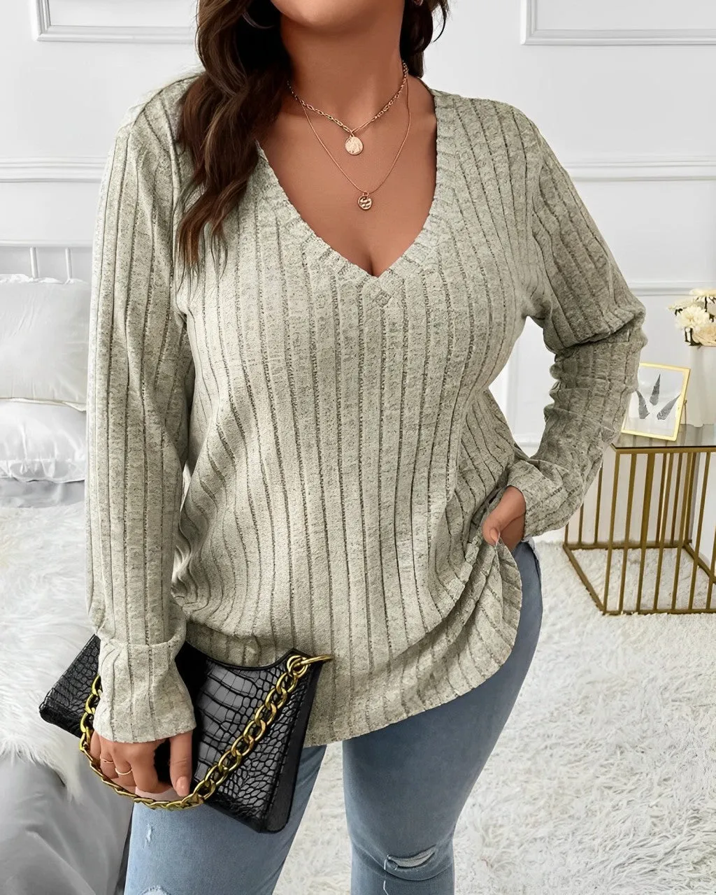 Shirlee - Haut rayé à manches longues et design épuré